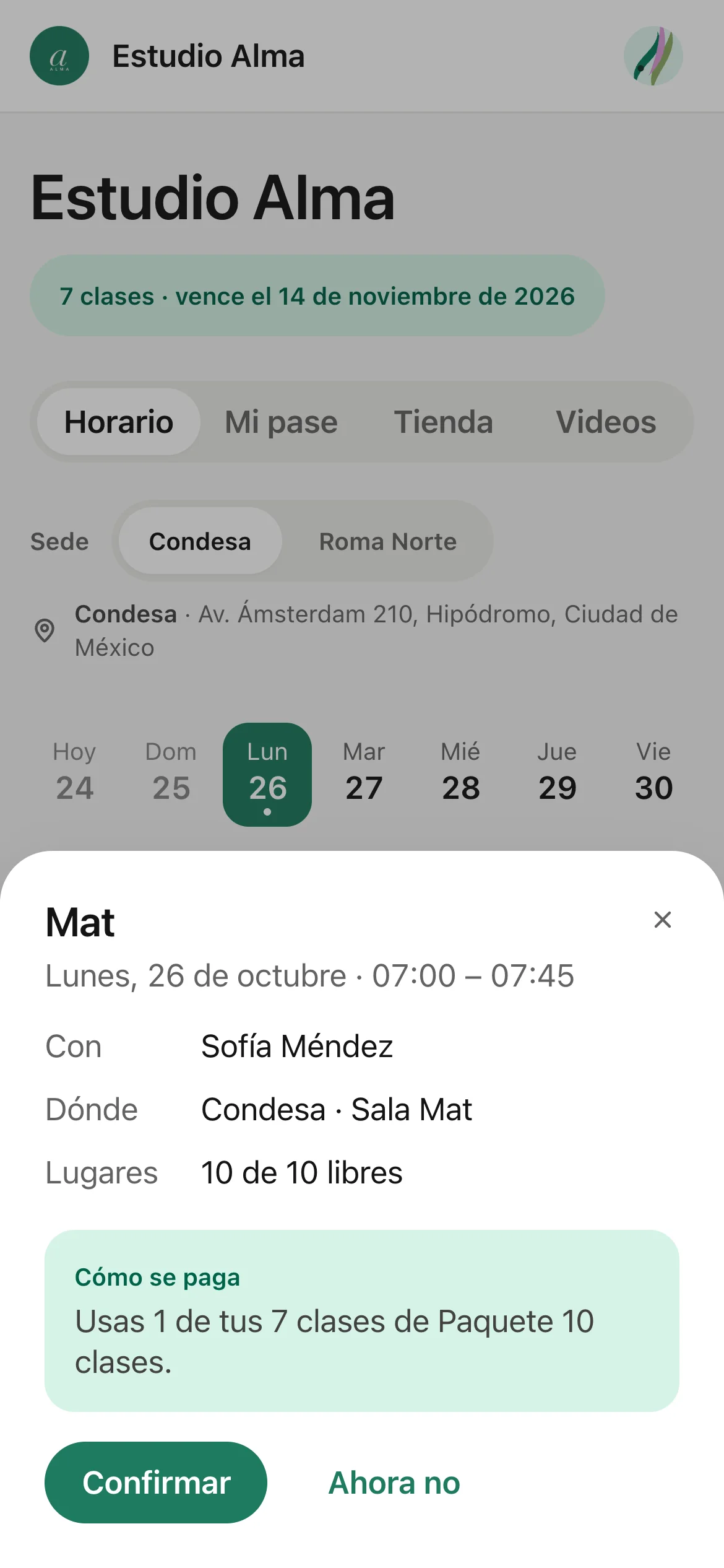 El cuadro para apartar una clase de Mat con cómo se paga y el botón Confirmar.